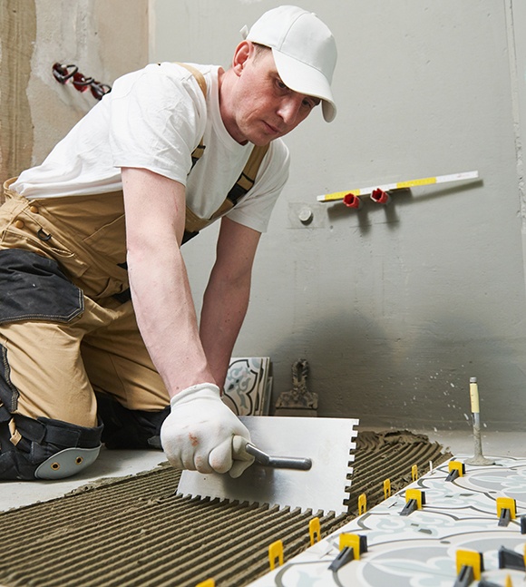 Installation professional placing new floors